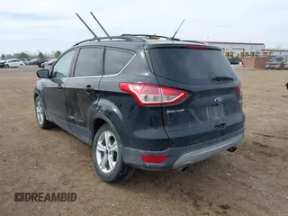2016 Ford Escape SE with VIN 1FMCU9G98GUA63081, listed as a IAAI auction lot 42101978 with 199,468 mi miles and . Bid and sale history available at DreamBid. Image 3.