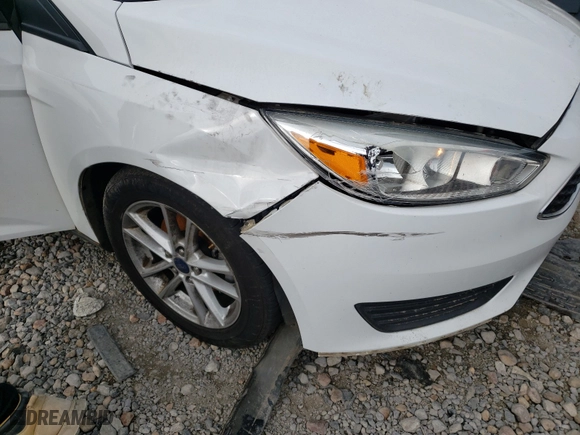 2016 Ford Focus SE with VIN 1FADP3K29GL374716, listed as a Copart auction lot 43301711 with 105,738 mi miles and Salvage Title. Bid and sale history available at carsss.com. Image 9.