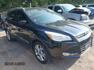 2014 Ford Escape Titanium with VIN 1FMCU9J93EUD60149, listed as a IAAI auction lot 39837388 with 154,880 mi miles. Bid and sale history available at carsss.com. Image 1.
