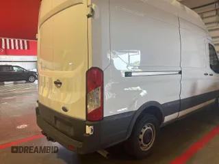 2023 Ford Transit Cargo with VIN 1FTBR1X86PKC09421, listed as a IAAI auction lot 42796097 with 10,233 mi miles and . Bid and sale history available at DreamBid. Image 25.