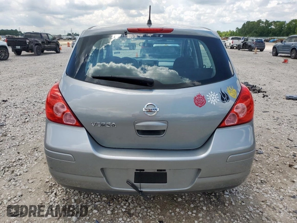 2010 Nissan Versa S with VIN 3N1BC1CP9AL372491, listed as a Copart auction lot 62467025 with 68,977 mi miles and Salvage title. Bid and sale history available at DreamBid. Image 6.