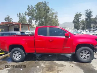 2019 Chevrolet Colorado 2WD Work Truck with VIN 1GCHSBEN3K1100815, listed as a IAAI auction lot 42127659 with Not Provided miles and . Bid and sale history available at DreamBid. Image 14.