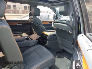 2022 Jeep Grand Wagoneer Series II with VIN 1C4SJVFJ8NS139713, listed as a IAAI auction lot 42585321 with 35,798 mi miles and . Bid and sale history available at DreamBid. Image 8.