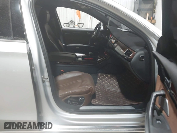 2011 Audi A8 with VIN WAURVAFD5BN014214, listed as a IAAI auction lot 41396044 with 131,764 mi miles and . Bid and sale history available at DreamBid. Image 5.