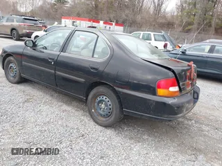 1999 Nissan Altima XE with VIN 1N4DL01DXXC148729, listed as a IAAI auction lot 41697641 with 187,596 mi miles. Bid and sale history available at carsss.com. Image 3.