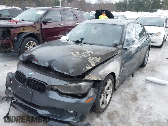 2014 BMW 3 Series 328d xDrive with VIN WBA3D5C55EKX98381, listed as a IAAI auction lot 41590673 with Not Provided miles. Bid and sale history available at carsss.com. Image 2.
