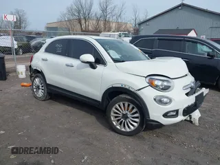 2016 FIAT 500X Lounge z VIN ZFBCFYDT0GP328541, wystawiony jako IAAI lot #42016388 z przebiegiem 134 806 mil mil oraz . Historia ofert i sprzedaży dostępna na DreamBid. Obrazek 1.