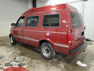 1992 GMC Safari z VIN 1GDEL19W2NB539396, wystawiony jako Copart lot #79221434 z przebiegiem 99 406 mil mil oraz Nie do naprawy. Historia ofert i sprzedaży dostępna na DreamBid. Obrazek 2.