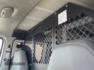 2007 Ford Econoline Cargo Commercial z VIN 1FTNE24L87DA74843, wystawiony jako IAAI lot #42339810 z przebiegiem Nie podano mil oraz . Historia ofert i sprzedaży dostępna na DreamBid. Obrazek 1.
