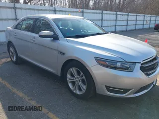 2013 Ford Taurus SEL with VIN 1FAHP2E8XDG191132, listed as a IAAI auction lot 41833542 with 165,125 mi miles. Bid and sale history available at carsss.com. Image 1.