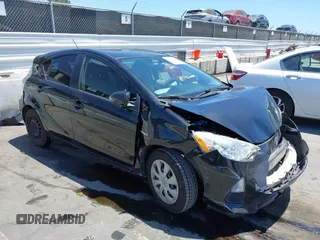 2012 Toyota Prius One z VIN JTDKDTB33C1017704, wystawiony jako IAAI lot #42227623 z przebiegiem 116 058 mil mil oraz . Historia ofert i sprzedaży dostępna na DreamBid. Obrazek 1.