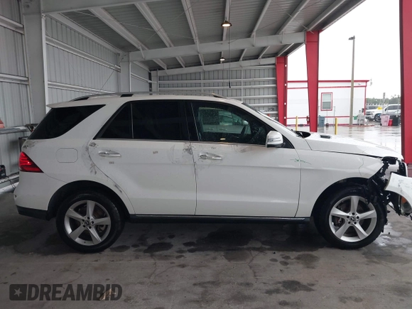 2017 Mercedes-Benz GLE 350 z VIN 4JGDA5HB1HA964089, wystawiony jako IAAI lot #42399546 z przebiegiem 106 557 mil mil oraz . Historia ofert i sprzedaży dostępna na DreamBid. Obrazek 14.