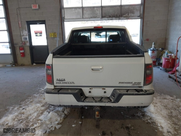 2014 Honda Ridgeline RTL with VIN 5FPYK1F55EB012490, listed as a IAAI auction lot 41391884 with 130,121 mi miles. Bid and sale history available at carsss.com. Image 16.
