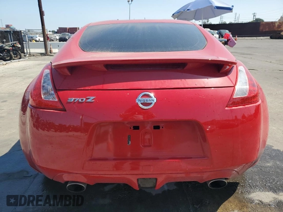 2009 Nissan 370Z Touring with VIN JN1AZ44EX9M402480, listed as a Copart auction lot 74838314 with 0 mi miles and Salvage Title. Bid and sale history available at carsss.com. Image 6.