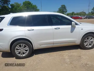 2024 Cadillac XT6 FWD Luxury z VIN 1GYKPAR49RZ739032, wystawiony jako IAAI lot #41985694 z przebiegiem 20 595 mil mil oraz . Historia ofert i sprzedaży dostępna na DreamBid. Obrazek 13.