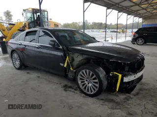 2011 BMW 7 Series 750i xDrive with VIN WBAKC6C56BC394810, listed as a Copart auction lot 79025014 with 152,399 mi miles and Salvage title. Bid and sale history available at DreamBid. Image 4.