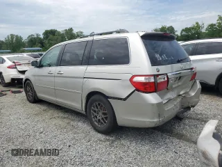 2006 Honda Odyssey Touring z VIN 5FNRL38886B000011, wystawiony jako Copart lot #57399225 z przebiegiem 256 217 mil mil oraz Szkoda całkowita • Salvage title. Historia ofert i sprzedaży dostępna na DreamBid. Obrazek 2.
