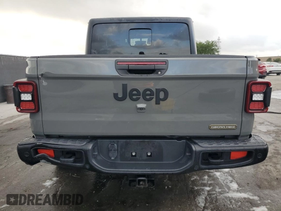 2021 Jeep Gladiator Sport S с VIN 1C6JJTAG1ML562354, выставлен на аукционе Copart как лот 54850185 с пробегом 67 473 миль миль и На запчасти • Non repairable. История ставок и продаж доступна на DreamBid. Изображение 6.