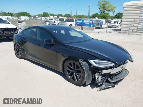 2021 Tesla Model S Plaid with VIN 5YJSA1E66MF452258, listed as a IAAI auction lot 41832000 with 42,845 mi miles and . Bid and sale history available at DreamBid. Image 1.