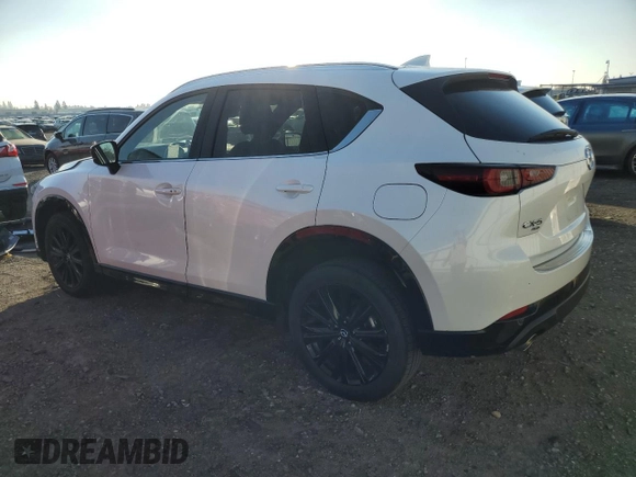 2022 Mazda CX-5 2.5 Turbo with VIN JM3KFBAY7N0597010, listed as a Copart auction lot 83062114 with 18,136 mi miles and Salvage Title. Bid and sale history available at carsss.com. Image 2.