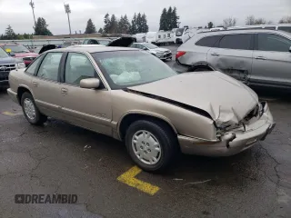 1996 Buick Regal Custom with VIN 2G4WB52K7T1426501, listed as a Copart auction lot 84858184 with 89,553 mi miles and Salvage title. Bid and sale history available at DreamBid. Image 4.