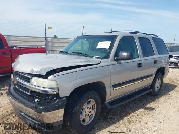 2005 Chevrolet Tahoe LT z VIN 1GNEC13T25J147583, wystawiony jako IAAI lot #42275971 z przebiegiem 244 307 mil mil oraz . Historia ofert i sprzedaży dostępna na DreamBid. Obrazek 2.