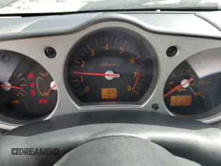2004 Nissan 350Z Touring z VIN JN1AZ36AX4T000784, wystawiony jako Copart lot #50052625 z przebiegiem 33 595 mil mil oraz Nie do naprawy • Non repairable. Historia ofert i sprzedaży dostępna na DreamBid. Obrazek 9.