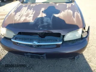 1999 Nissan Altima XE with VIN 1N4DL01D3XC209869, listed as a IAAI auction lot 41414580 with 175,076 mi miles. Bid and sale history available at carsss.com. Image 6.