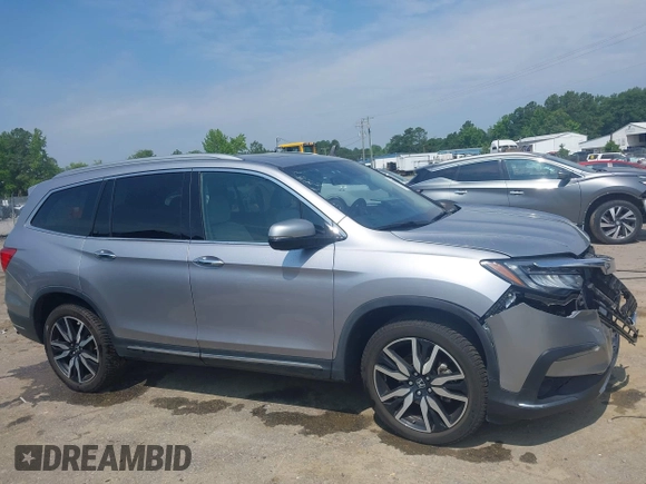 2019 Honda Pilot Elite with VIN 5FNYF6H08KB025449, listed as a IAAI auction lot 42450139 with 98,368 mi miles and . Bid and sale history available at DreamBid. Image 13.