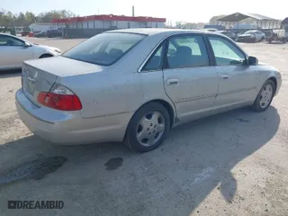 2003 Toyota Avalon XL with VIN 4T1BF28B53U302854, listed as a IAAI auction lot 42057098 with 230,127 mi miles. Bid and sale history available at carsss.com. Image 4.