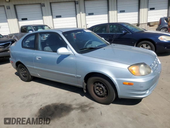 2003 Hyundai Accent GL with VIN KMHCG35CX3U274974, listed as a Copart auction lot 68807494 with 133,791 mi miles and Non Repairable. Bid and sale history available at carsss.com. Image 4.