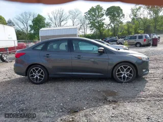 2017 Ford Focus SEL with VIN 1FADP3H22HL305908, listed as a IAAI auction lot 42084489 with 94,757 mi miles. Bid and sale history available at carsss.com. Image 13.