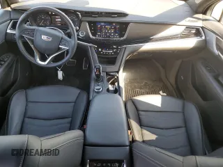 2023 Cadillac XT6 AWD Sport z VIN 1GYKPHRSXPZ181132, wystawiony jako Copart lot #50512825 z przebiegiem 17 302 mil mil oraz Szkody całkowita. Historia ofert i sprzedaży dostępna na DreamBid. Obrazek 8.