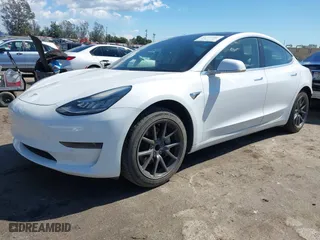 2020 Tesla Model 3 Standard Range Plus with VIN 5YJ3E1EA4LF644967, listed as a IAAI auction lot 41745984 with 23,479 mi miles. Bid and sale history available at carsss.com. Image 2.