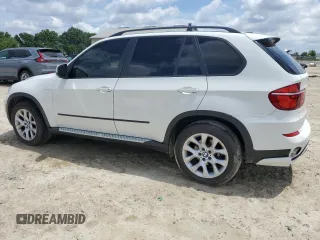 2012 BMW X5 35i с VIN 5UXZV4C58CL987049, выставлен на аукционе Copart как лот 61013925 с пробегом 167 508 миль миль и Чистый • Clean title. История ставок и продаж доступна на DreamBid. Изображение 2.