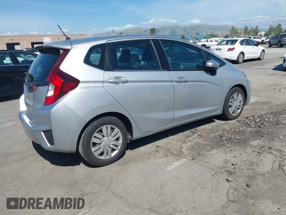 2015 Honda Fit LX z VIN 3HGGK5H51FM750102, wystawiony jako IAAI lot #42278830 z przebiegiem 121 855 mil mil oraz . Historia ofert i sprzedaży dostępna na DreamBid. Obrazek 4.