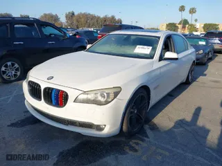2010 BMW 7 Series 750Li with VIN WBAKB8C58ACY63604, listed as a IAAI auction lot 41986270 with 131,865 mi miles. Bid and sale history available at carsss.com. Image 2.
