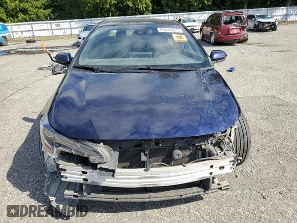 2020 Toyota Corolla SE with VIN JTDP4RCE3LJ004394, listed as a Copart auction lot 55039085 with 98,579 mi miles and Salvage Title. Bid and sale history available at DreamBid. Image 5.