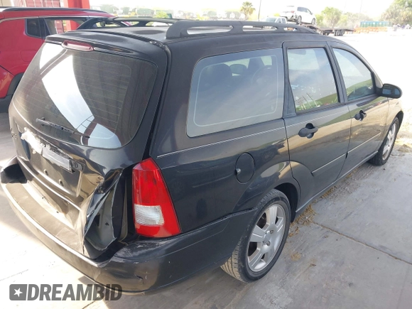 2004 Ford Focus ZTW with VIN 1FAFP35Z64W173237, listed as a IAAI auction lot 42685899 with 209,690 mi miles and . Bid and sale history available at DreamBid. Image 4.