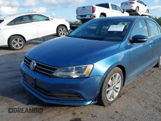 2016 Volkswagen Jetta Sedan 1.4T SE with VIN 3VWD67AJ0GM328412, listed as a IAAI auction lot 41556254 with 137,814 mi miles. Bid and sale history available at carsss.com. Image 6.