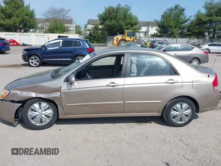 2009 Kia Spectra EX with VIN KNAFE222295604149, listed as a IAAI auction lot 42112191 with 110,708 mi miles and . Bid and sale history available at DreamBid. Image 14.