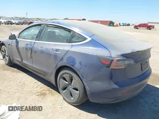 2020 Tesla Model 3 Standard Range Plus z VIN 5YJ3E1EA2LF739866, wystawiony jako IAAI lot #41842179 z przebiegiem 70 089 mil mil oraz . Historia ofert i sprzedaży dostępna na DreamBid. Obrazek 3.
