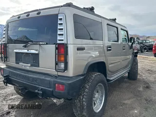2003 Hummer H2 with VIN 5GRGN23UX3H124517, listed as a Copart auction lot 41650395 with 999,999 mi miles and Clean Title. Bid and sale history available at carsss.com. Image 4.