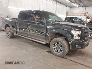 2015 Ford F-150 XLT w/HD Payload Pkg with VIN 1FTFW1EGXFFA39852, listed as a IAAI auction lot 41769971 with 163,929 mi miles. Bid and sale history available at carsss.com. Image 1.