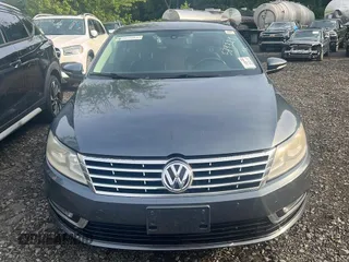 2013 Volkswagen CC R-Line with VIN WVWBP7AN1DE571321, listed as a Copart auction lot 70648784 with 122,061 mi miles and Clean Title. Bid and sale history available at carsss.com. Image 2.