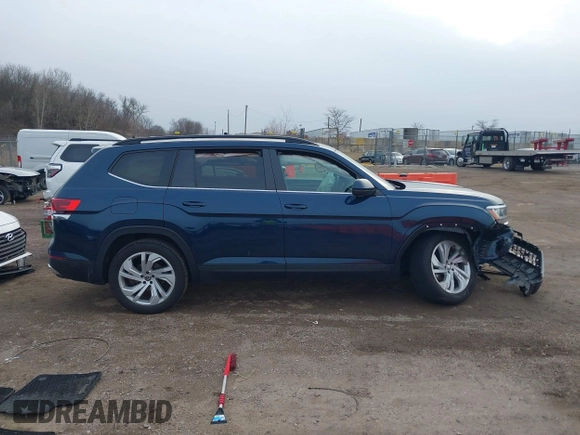 2023 Volkswagen Atlas SE z VIN 1V2KR2CA8PC504298, wystawiony jako IAAI lot #41234957 z przebiegiem 34 762 mil mil oraz . Historia ofert i sprzedaży dostępna na DreamBid. Obrazek 13.