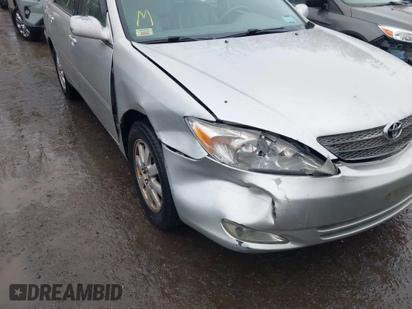 2004 Toyota Camry LE with VIN 4T1BF30K14U578385, listed as a IAAI auction lot 41547709 with 217,434 mi miles. Bid and sale history available at carsss.com. Image 6.