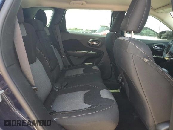 2016 Jeep Cherokee Altitude with VIN 1C4PJLAB2GW116661, listed as a Copart auction lot 53243165 with 94,708 mi miles and Salvage title. Bid and sale history available at DreamBid. Image 11.