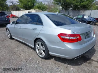 2013 Mercedes-Benz E-Class E 350 Luxury with VIN WDDHF8JB8DA740708, listed as a IAAI auction lot 42050622 with 243,585 mi miles. Bid and sale history available at carsss.com. Image 3.