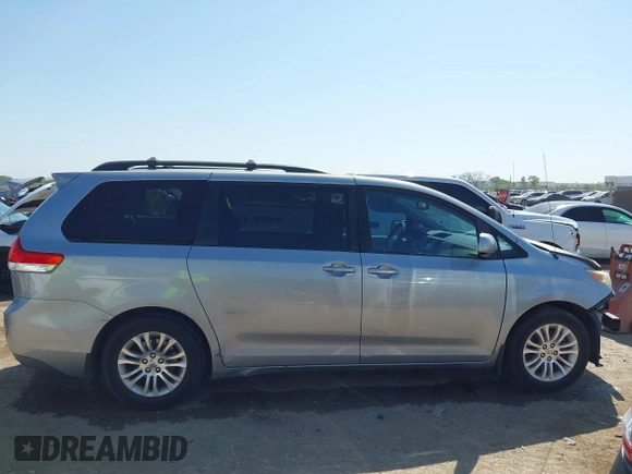 2011 Toyota Sienna XLE AAS with VIN 5TDYK3DC2BS048831, listed as a IAAI auction lot 42002556 with 231,906 mi miles and . Bid and sale history available at DreamBid. Image 14.